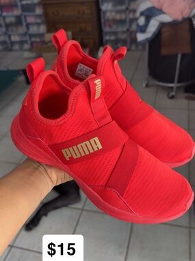 Puma Kids Slip-On Sneakers in Bold Red with Gold Logo